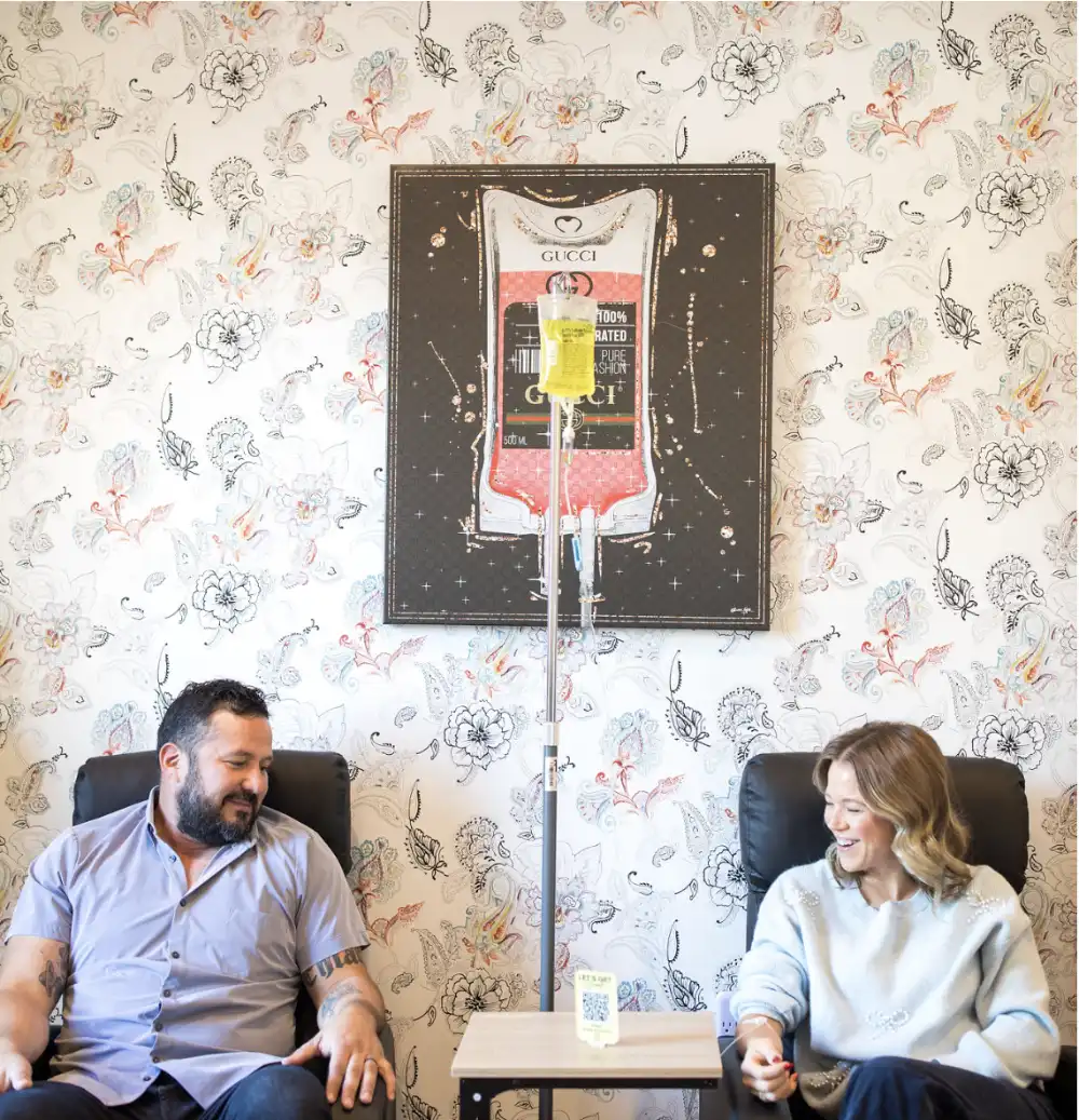 This is an image of a couple doing IV therapy.