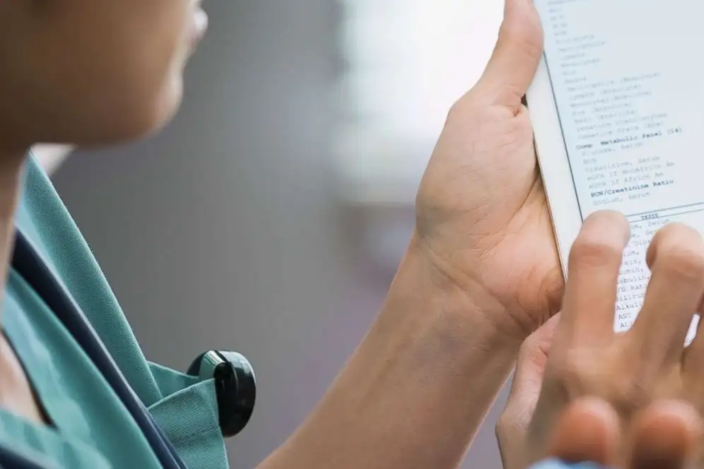 This is an image of a doctor reading an allergy test.