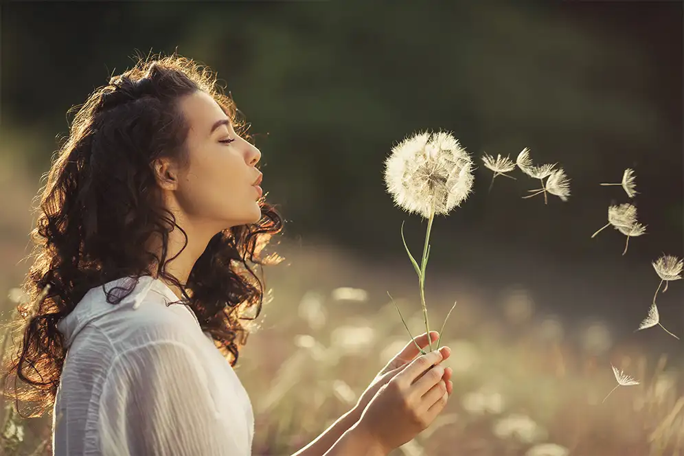 This is an image of a women with flowers.